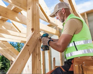 Framing Pro LA contractor using power tools for structural wood framing installation