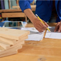 Framing Pro LA contractor reviewing construction plans for residential framing layout